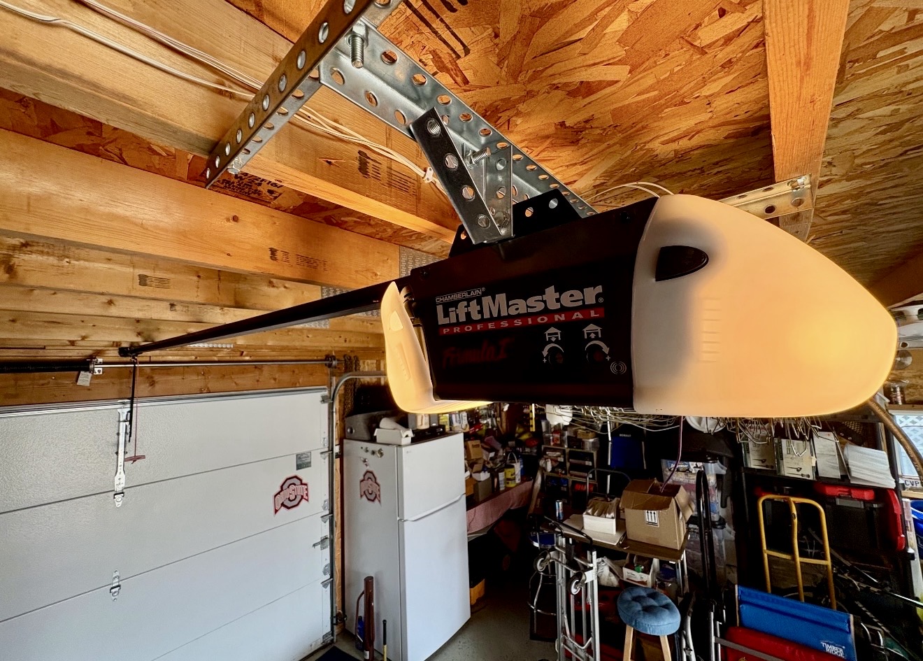 Older LiftMaster garage door opener before replacement