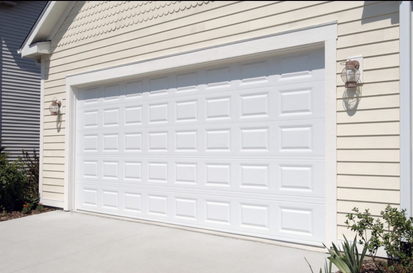 Classic white raised-panel double garage door